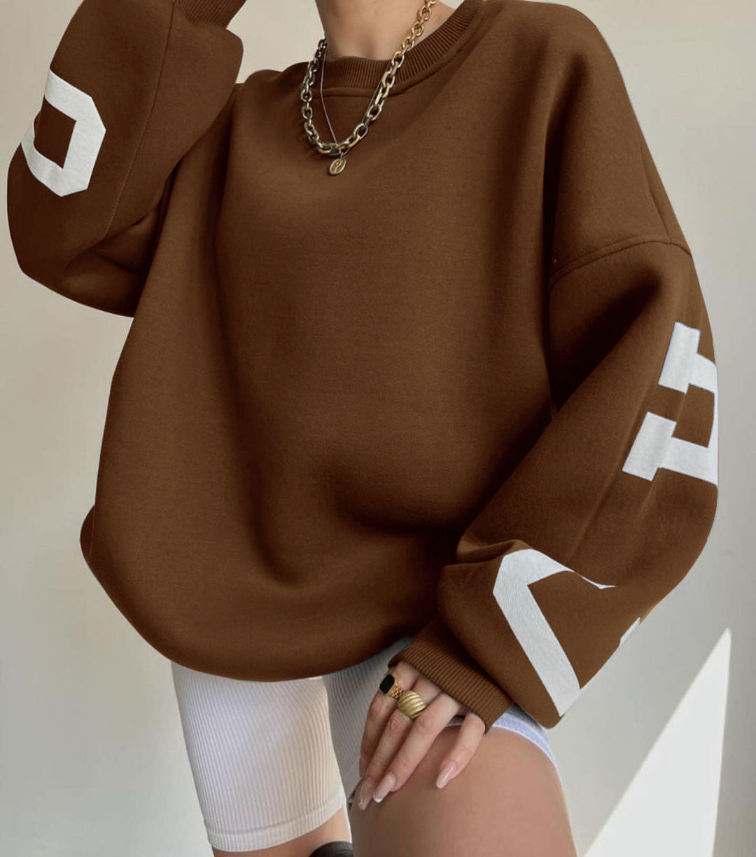 Nerisse – Oversized Sweatshirt mit grafischen Ärmeldetails