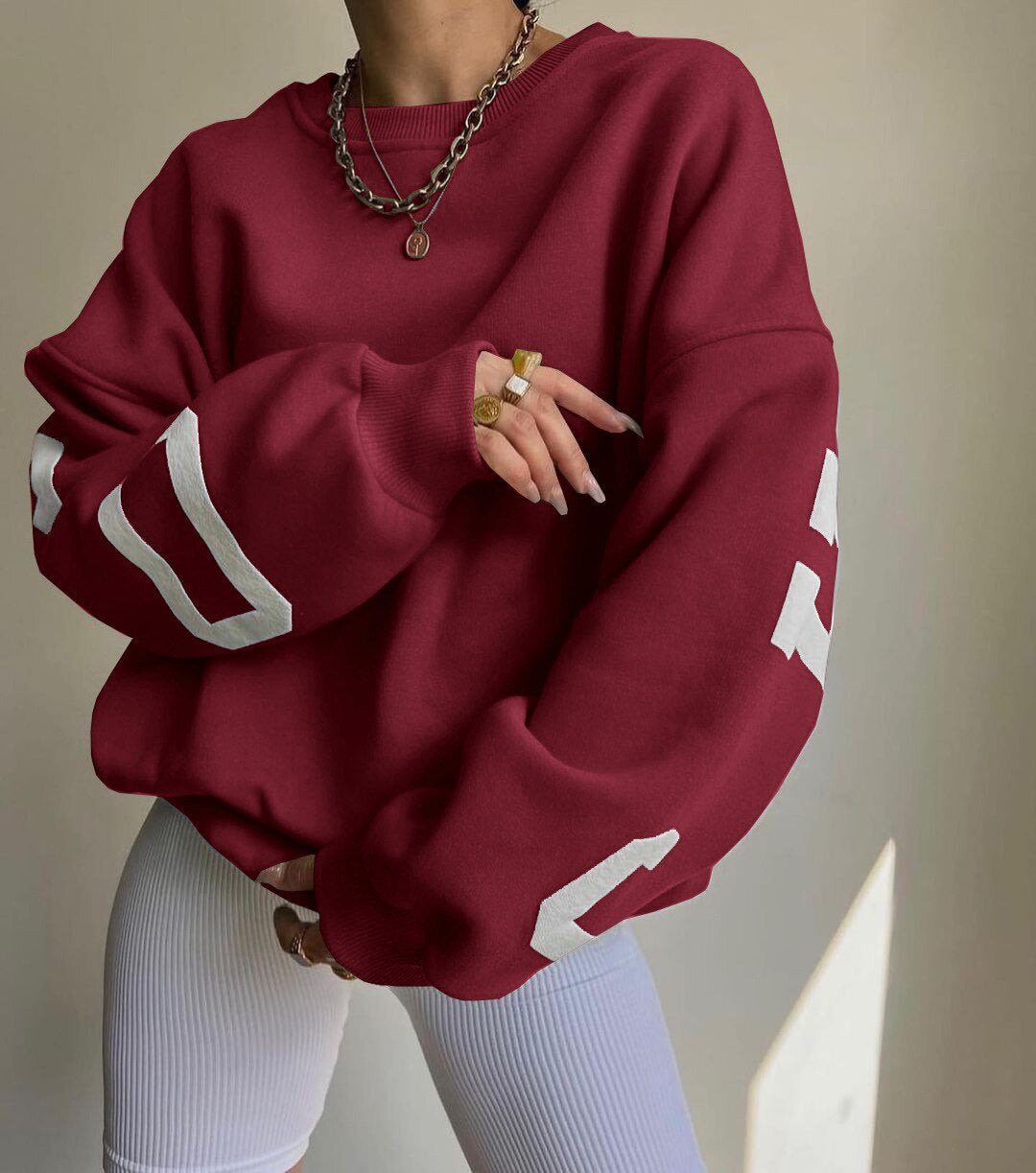 Nerisse – Oversized Sweatshirt mit grafischen Ärmeldetails