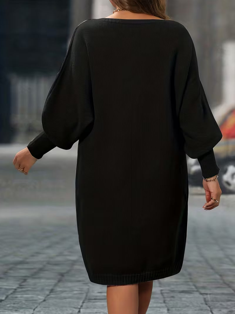 Elunara – Winterliches Strickkleid mit geometrischem Rautenmuster