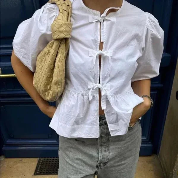 Elaria – Elegante Peplumbluse mit moderner Note