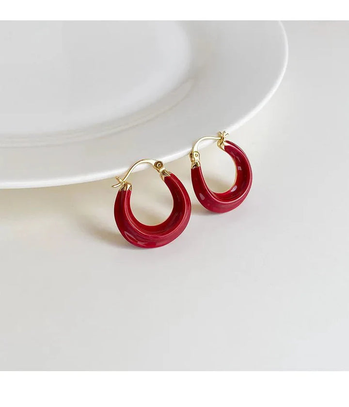 Azuréa – Asymmetrische Bogen-Ohrringe mit moderner Eleganz