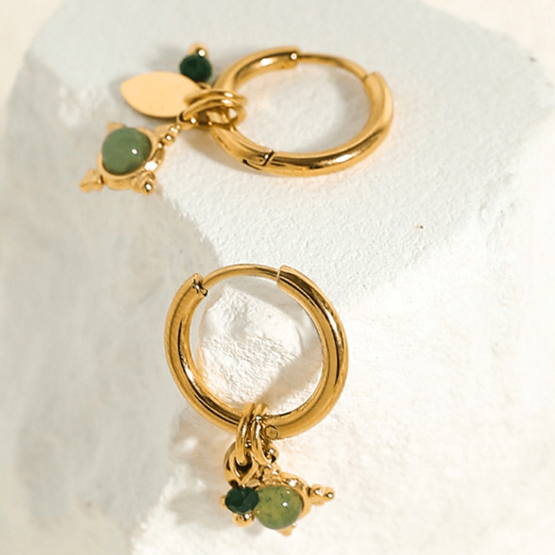 Émerielle – Sternohrringe mit smaragdgrünem Glanz