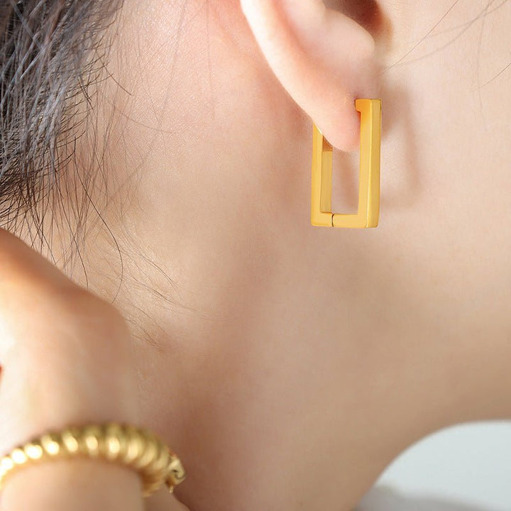 Quadréa – Glänzende Quadrat-Ohrringe mit zeitloser Eleganz